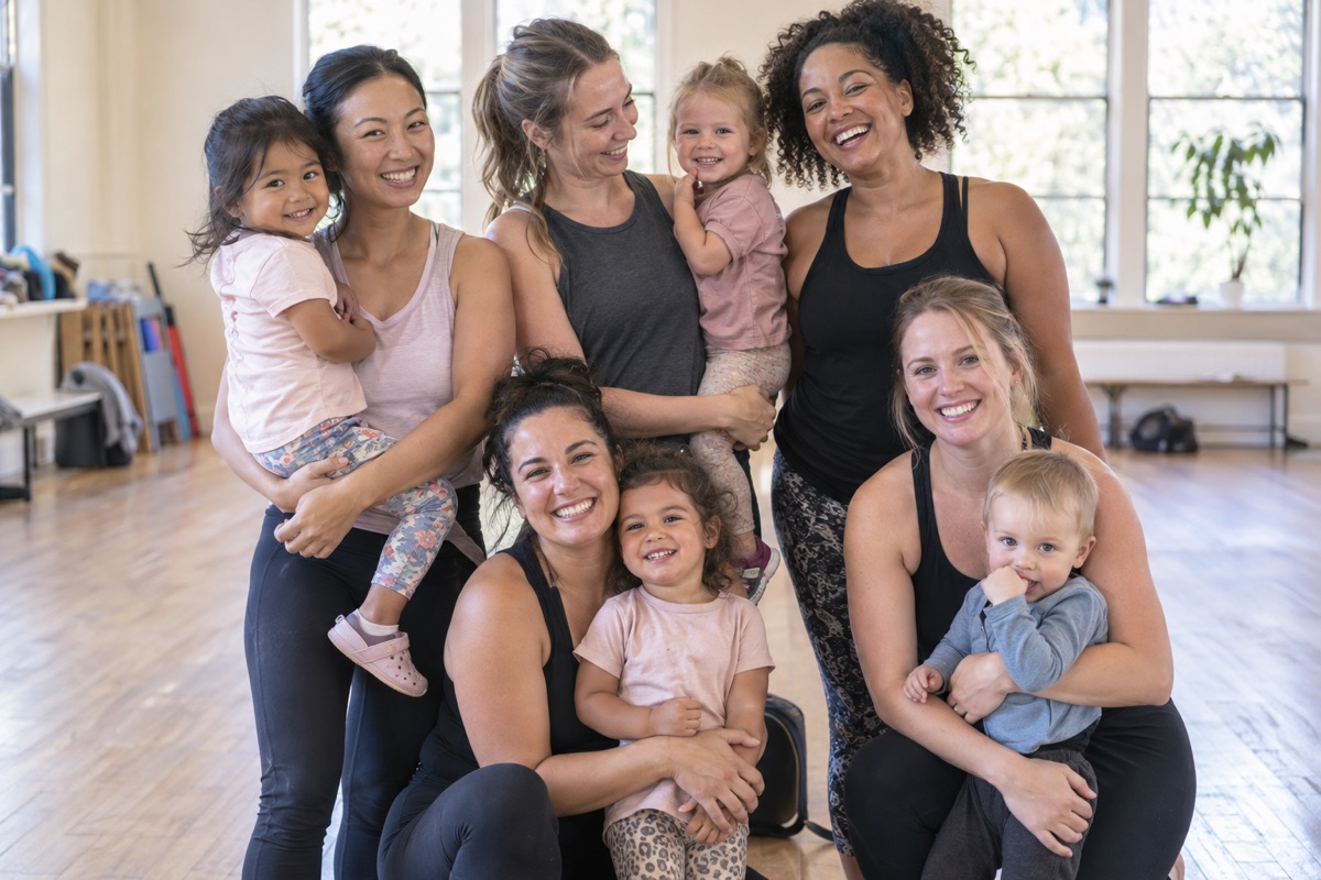 Mums and their children smiling together after a Dance with Mum session